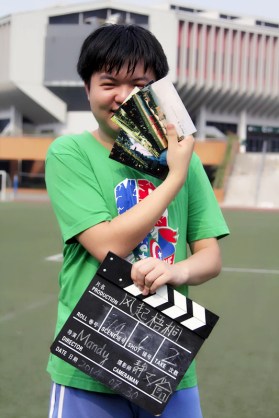 STSW on set with postcards and slate